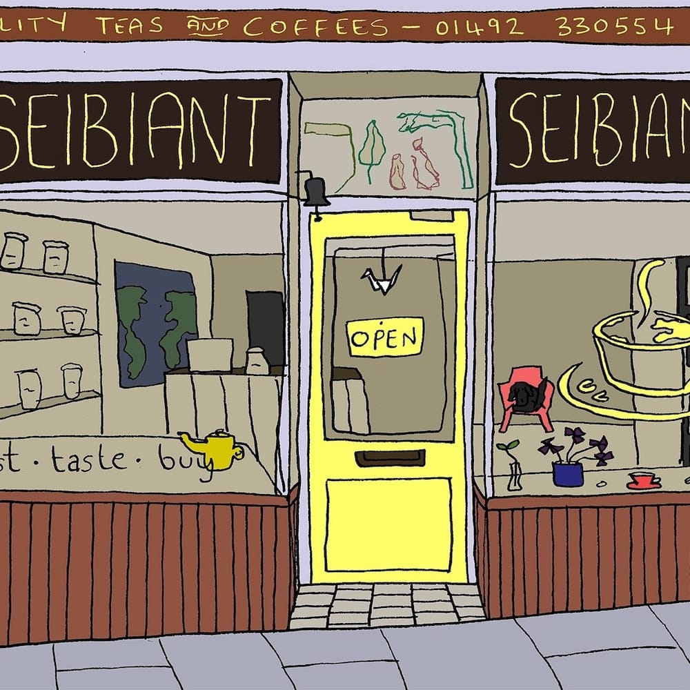 Illustration of a tea and coffee shop with the name Seibiant on the windows, an OPEN sign on the door, and shelves with jars and teapots visible inside.