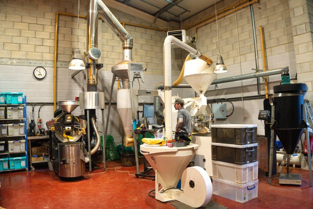 Coffee roasting equipment in use.