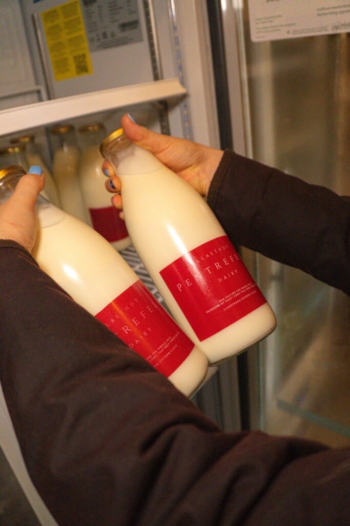 Two bottles of sustainably sourced, local organic milk.